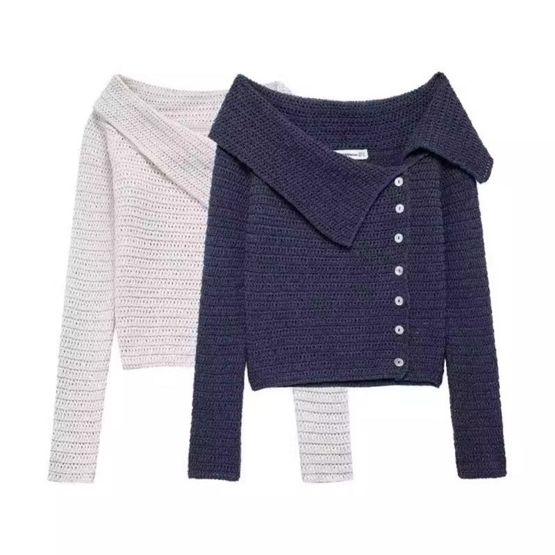 Elegant women's knitted vest with a deep collar and chic button details and style