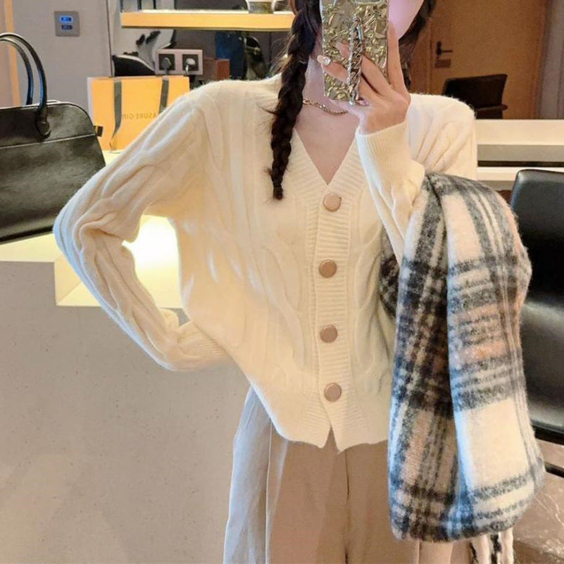 Cardigan pour femmes avec motif en cable et fermeture à boutons Chic & Stil