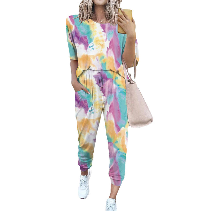 Ladies lightweight casual jumpsuit with a striking tie-dye pattern and practical pockets Lune London