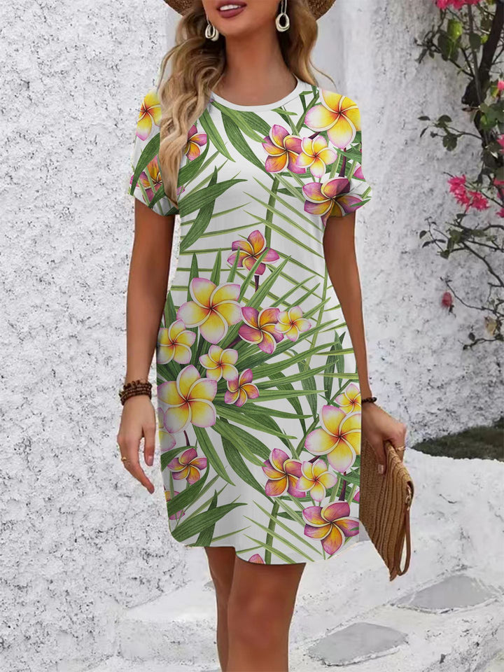 Women's comfortable casual dress with vibrant floral pattern and loose fit Lune London