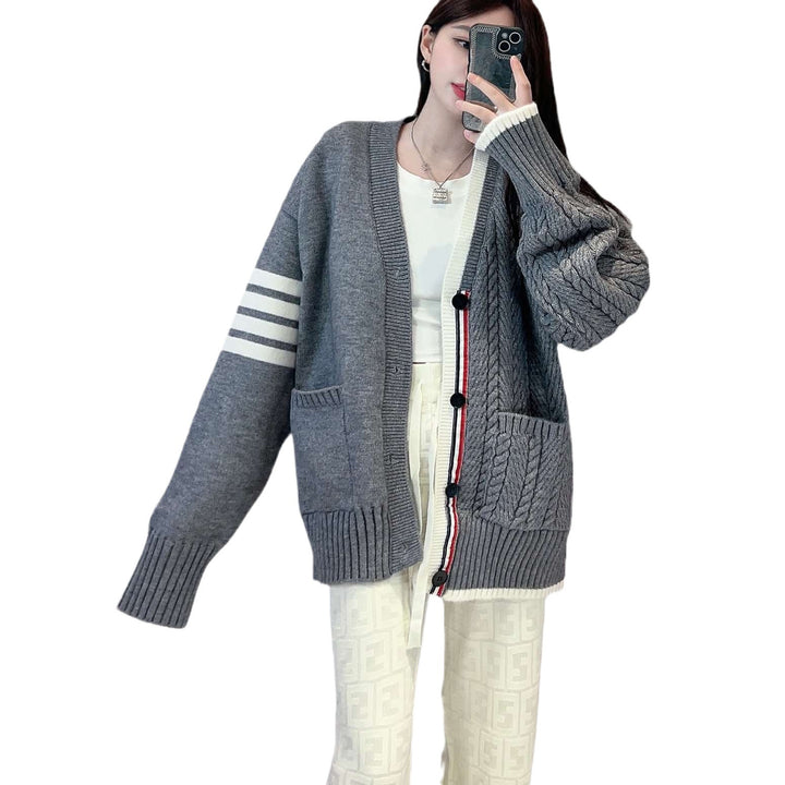 Women's chunky knit cardigan with cable pattern and generous pockets Lune London