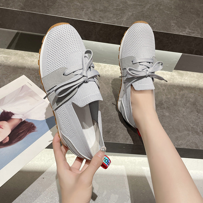 Women's sports sneakers with a breathable knitted upper and elastic accents Lune London
