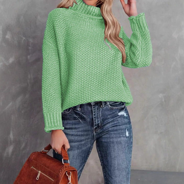 Comfortable knitted sweater for women with a high collar and airy structure Lune London