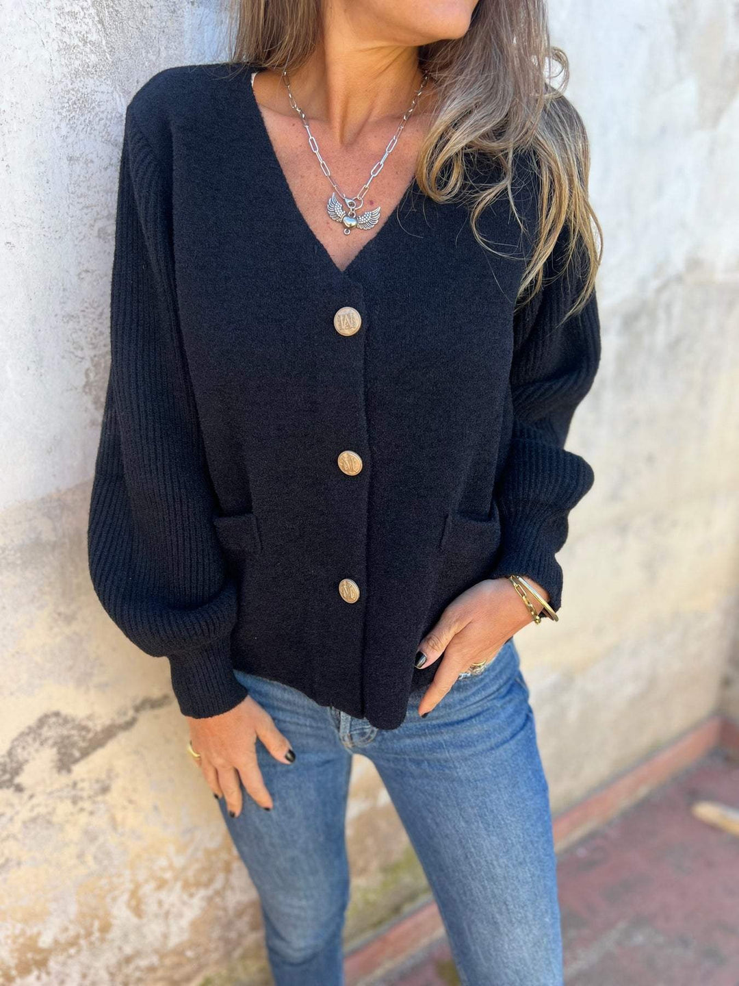 Ladies trendy knitted jacket with button details and pockets Lune London