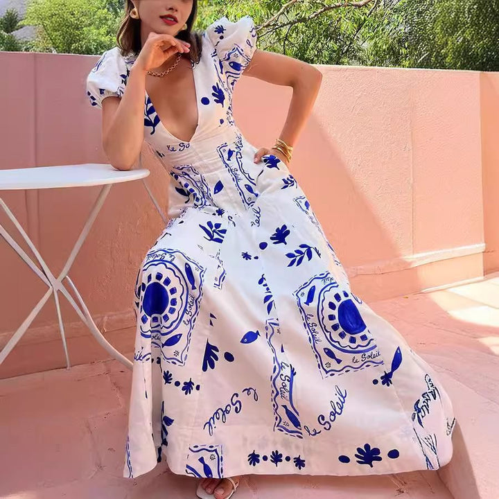 Maxi dress for women with voluminous puff sleeves and floral patterns Lune London