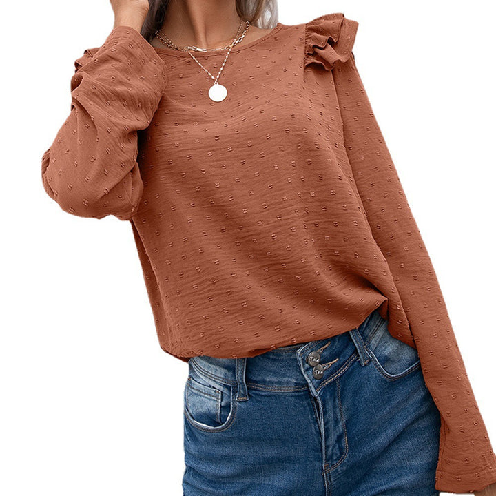 Casual women's top with ruffle details and textured surface Lune London