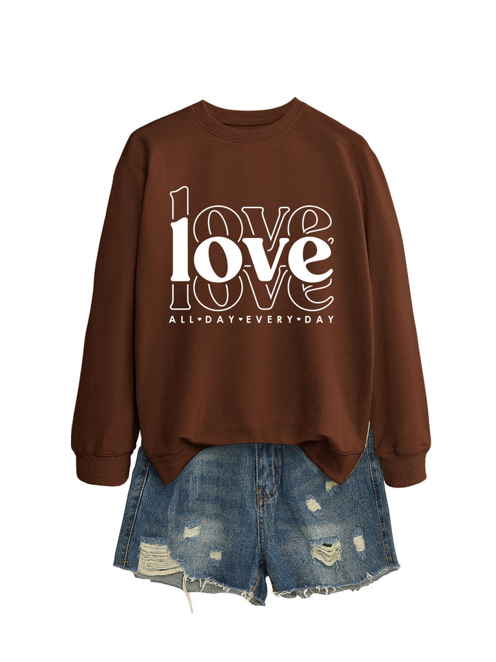 Sweat-shirt pour femmes avec des manches volumineuses et imprimé moderne "love" Chic & Stil