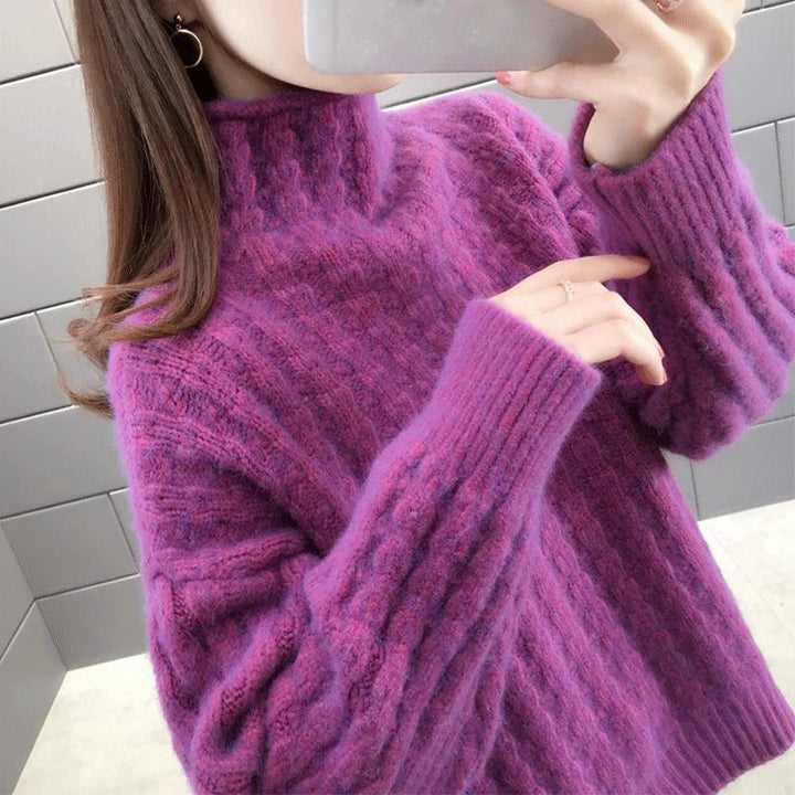 Knitted sweater for women with a modern ribbed design featuring a high collar and relaxed sleeves Lune London