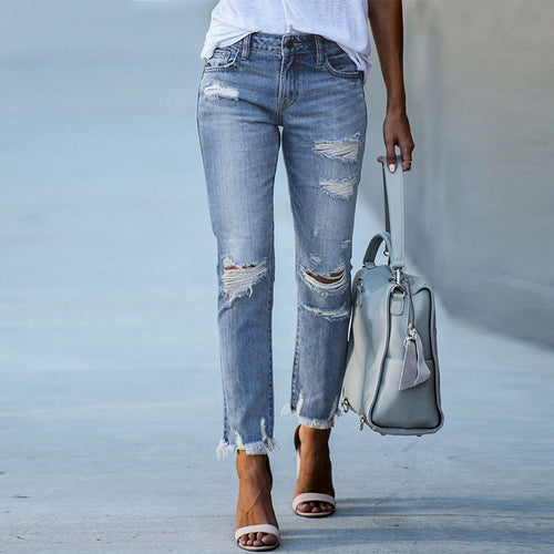 Destroyed jeans for women in a casual boyfriend style with frayed hems Lune London