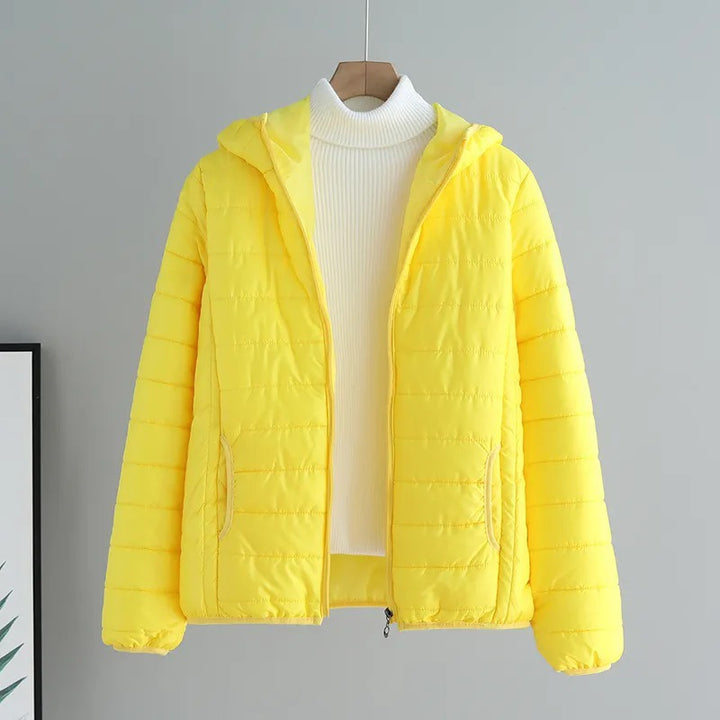 Ladies quilted transitional jacket with practical pockets and hood Lune London