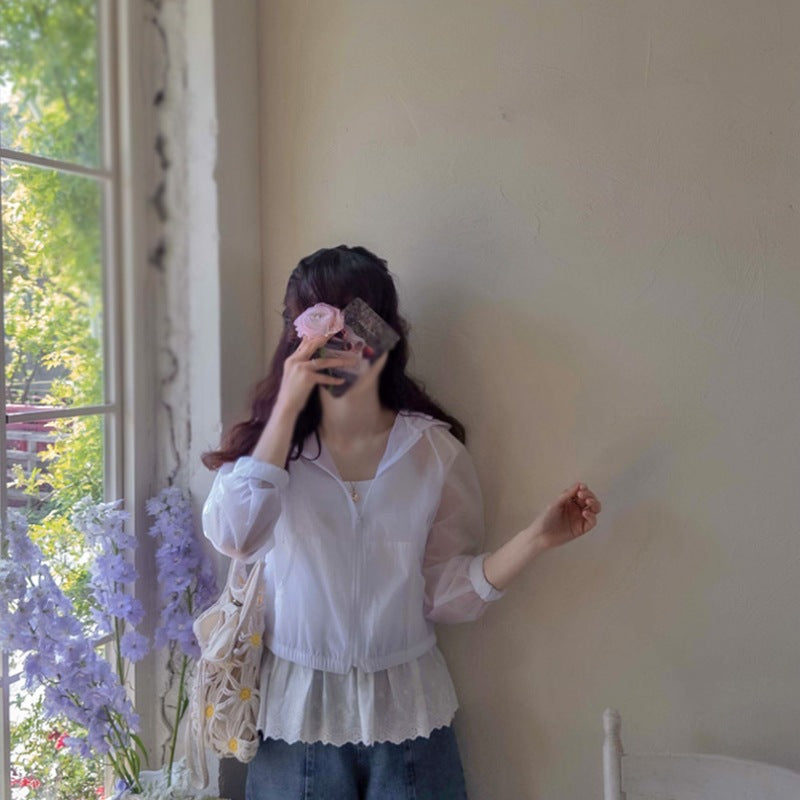 Blouse aérienne pour femmes avec col à fermeture éclair Chic & Stil