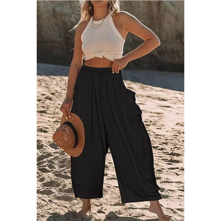 Casual harem pants for women with practical side pockets and loose fit Lune London