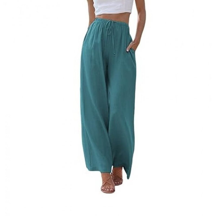 Wide palazzo pants for women with elastic waistband and side pockets Lune London