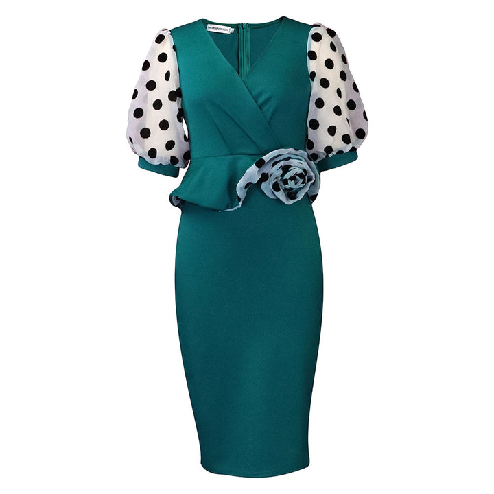 Fitted cocktail dress for women with sheer puff sleeves and floral accent Lune London