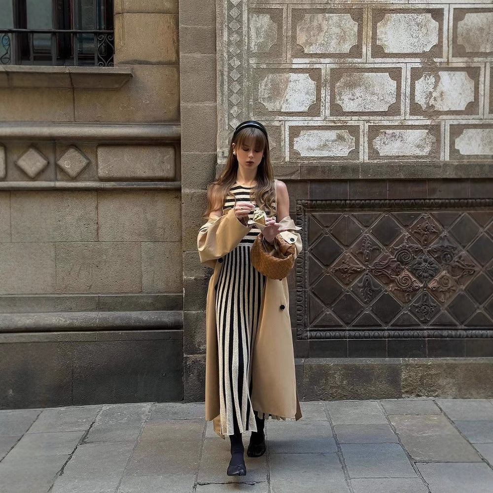 Maxi dress for women with an asymmetrical stripe pattern and elegant ruffle trim Lune London