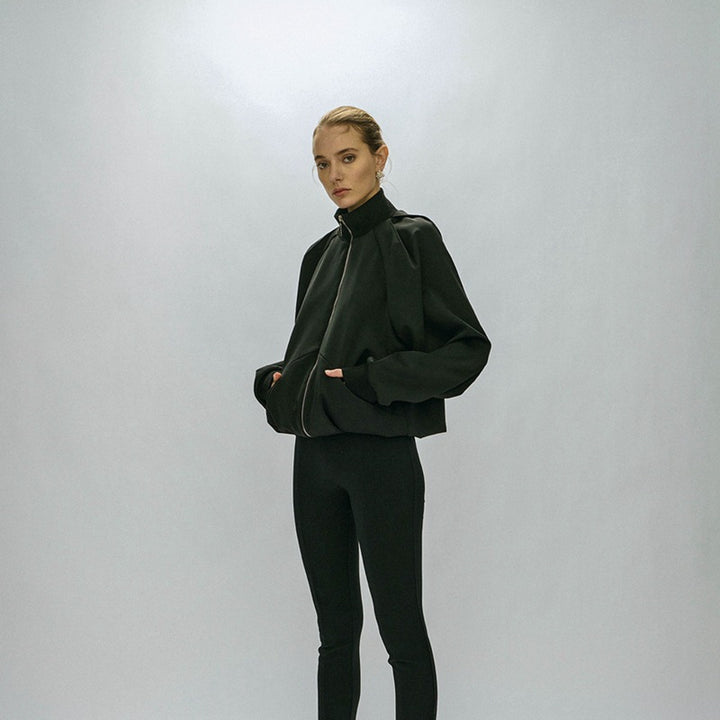 Women's sporty transitional jacket with high collar and practical zip pockets Lune London