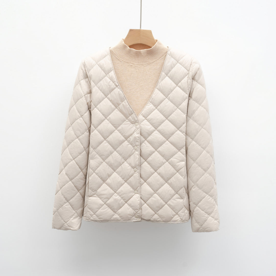 Quilted transitional jacket for women with modern V-neck and button closure Lune London