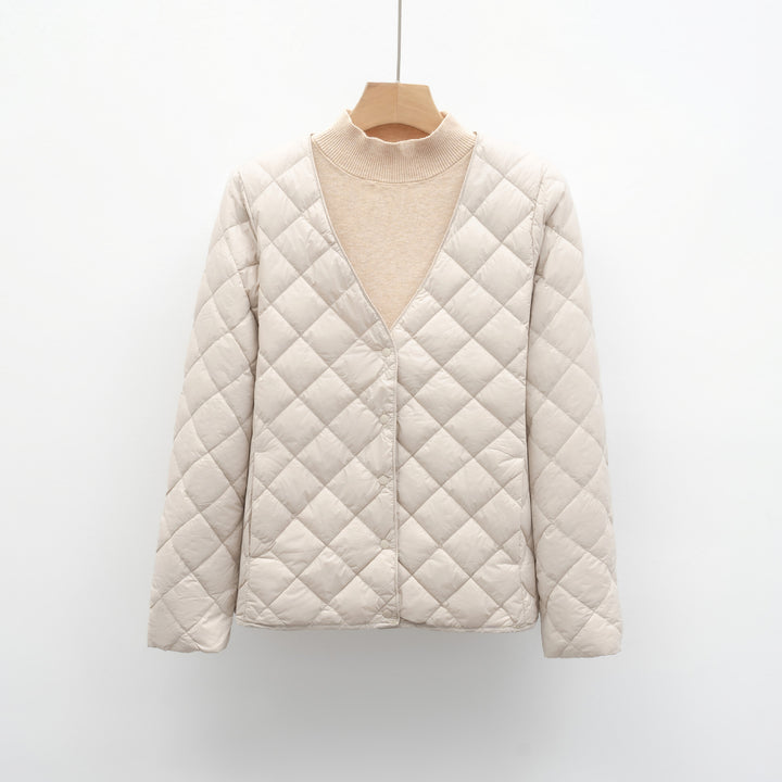 Quilted transitional jacket for women with modern V-neck and button closure Lune London