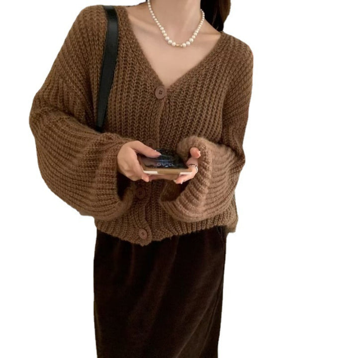 Cardigan pour femmes avec des manches surdimensionnées et détail de bouton Chic & Stil