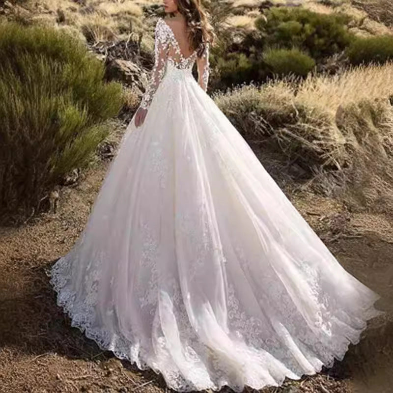 Women's Wedding Dress with Elegant Lace Detailing and Voluminous Skirt Lune London