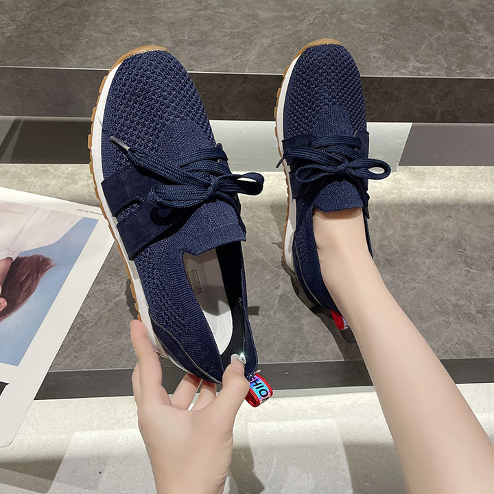 Women's sports sneakers with a breathable knitted upper and elastic accents Lune London