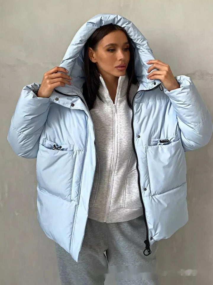 Sporty winter jacket for women with high collar and practical pockets Lune London