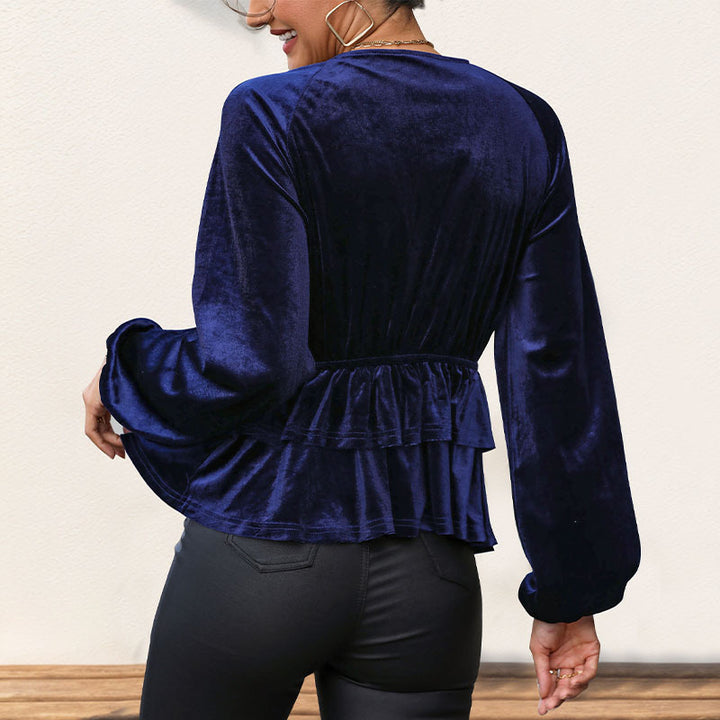 Top féminin avec un peplum volumineux et un décolleté en V profond Chic & Stil