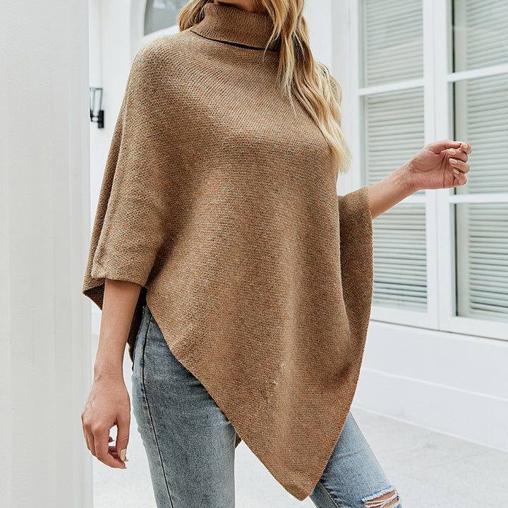 Lady knit poncho with high collar and decorative buttons Lune London