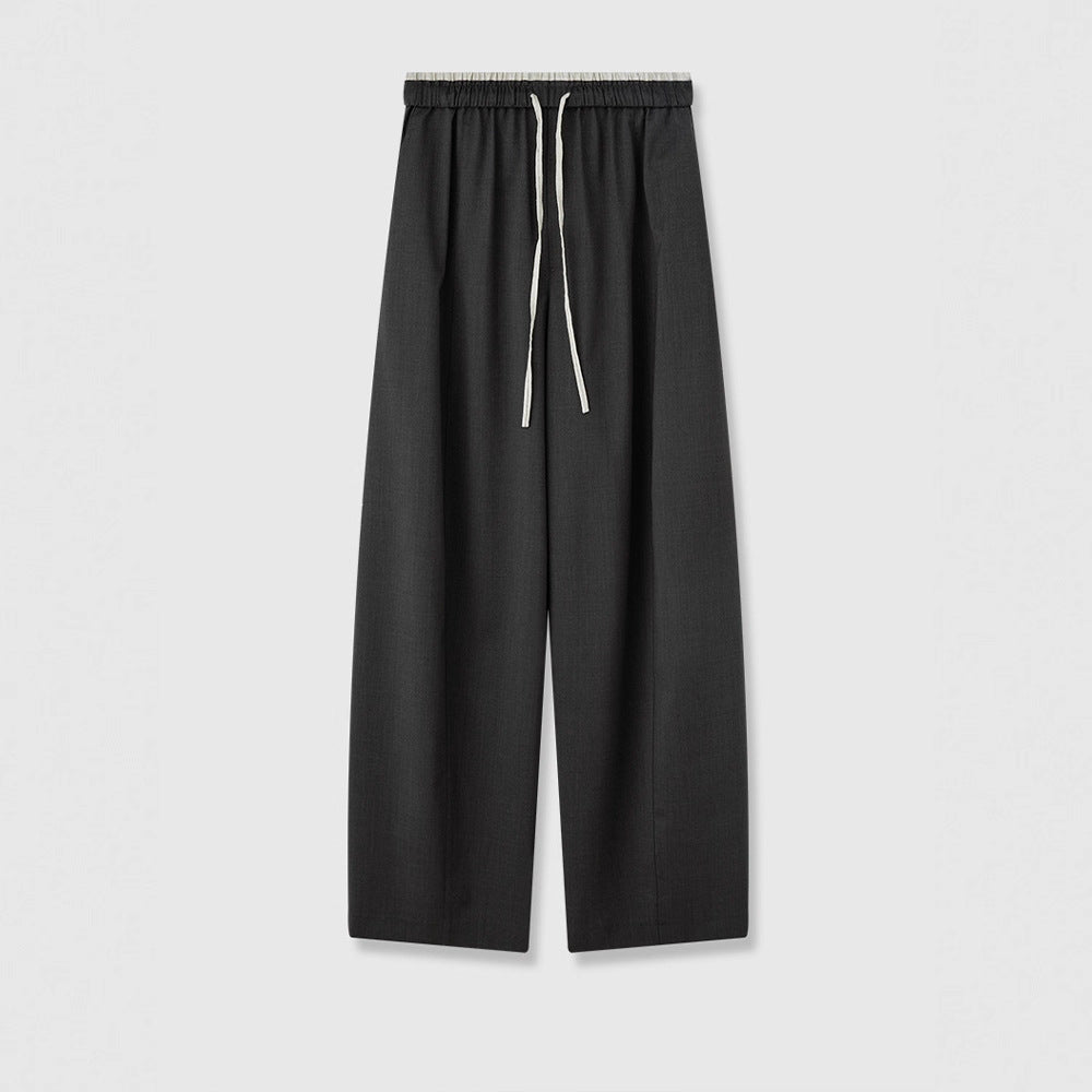 Pantalons en tissu large pour femmes avec taille élastique et poches pratiques Chic & Stil