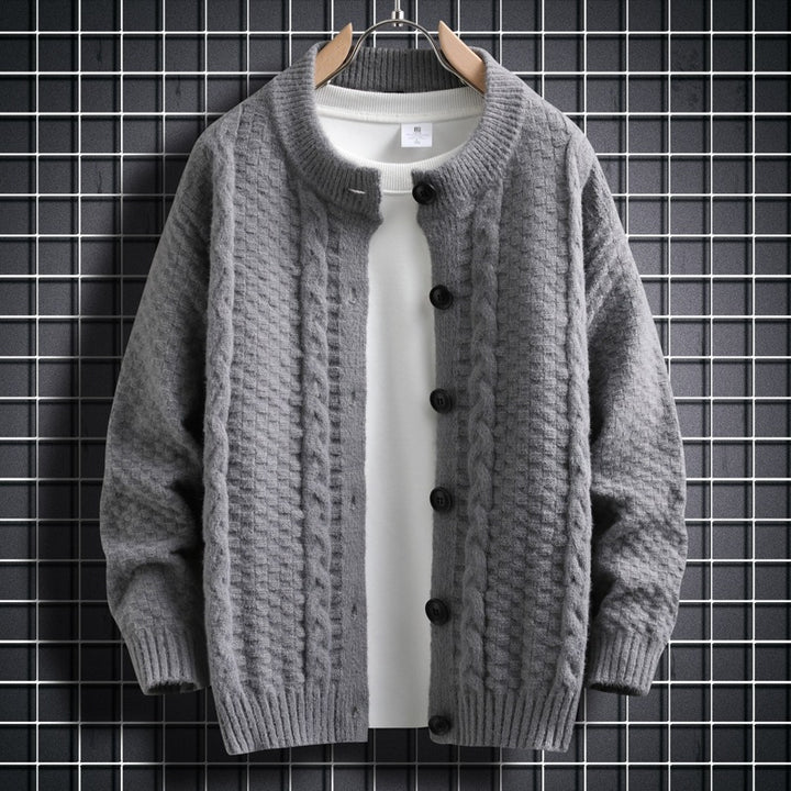 Women knitted cardigan with twisted pattern and buttons down the entire length Lune London