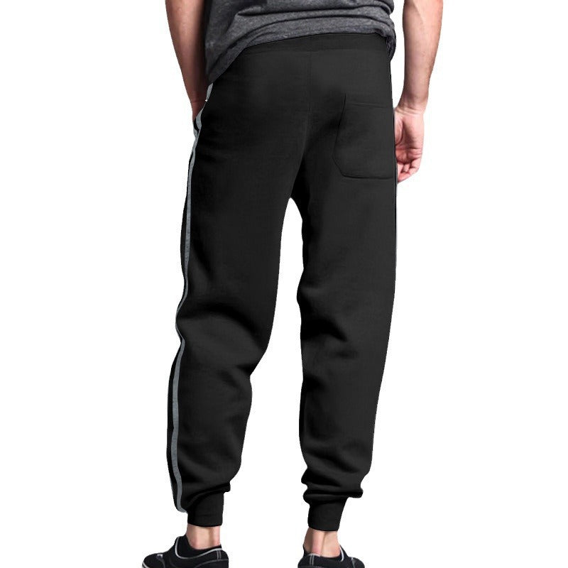 Sporty men's jogger pants with contrasting side stripes and an elastic waistband Lune London
