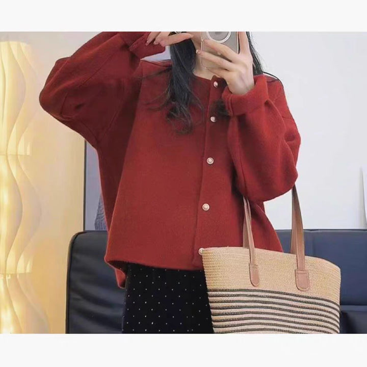 Women's chunky knit cardigan with elegant button placket and relaxed fit Lune London