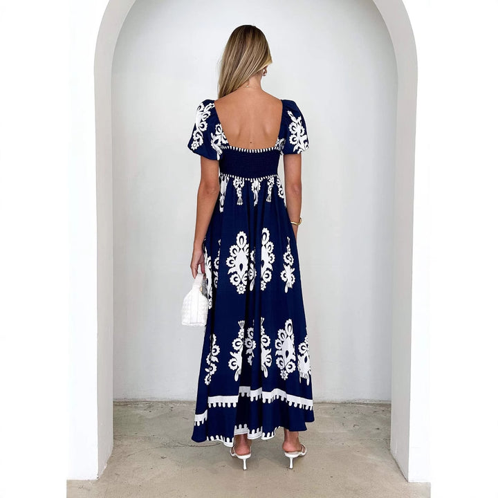 Maxi dress for women with decorative graphic pattern and puff sleeves Chic & Stil