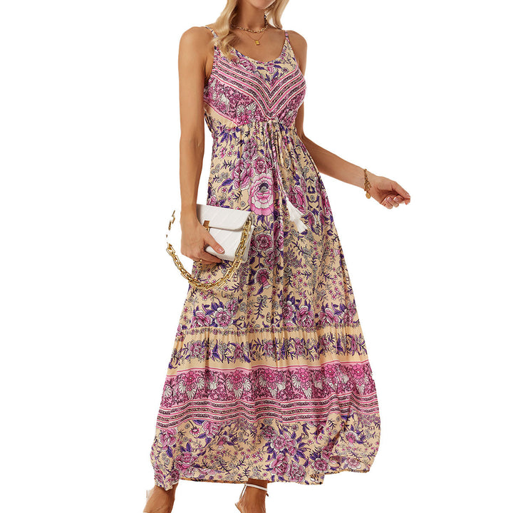 Airy maxi dress for women with a playful floral design and a drawstring at the waist Lune London