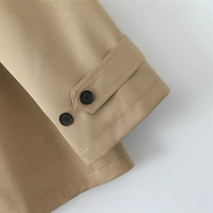 Trendy women's trench coat with a waist belt and practical pockets Lune London