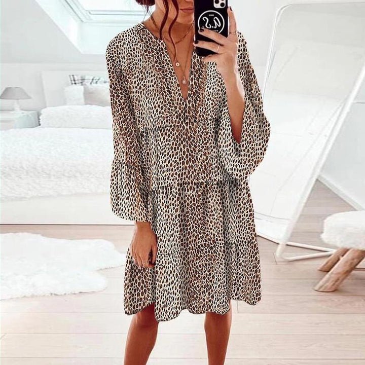 Robe maxi femme avec un élégant col en V et des manches volumineuses Chic & Stil