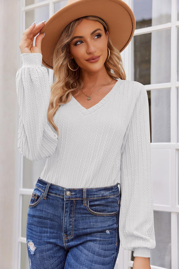 Women's knit sweater with a fine ribbed texture and a casual V-neck Lune London