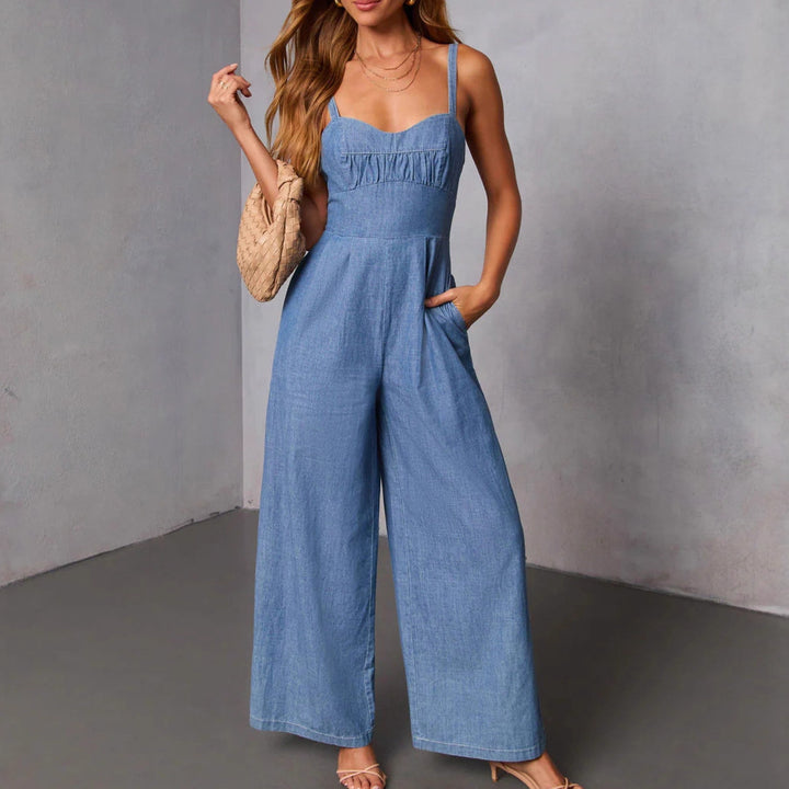 Chic & Stil Women's Denim Jumpsuit with Wide Legs and Elegant Straps