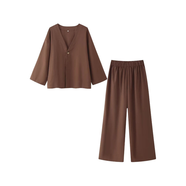 Ladies outfit consisting of an elegant V-neck blouse and wide palazzo pants Lune London