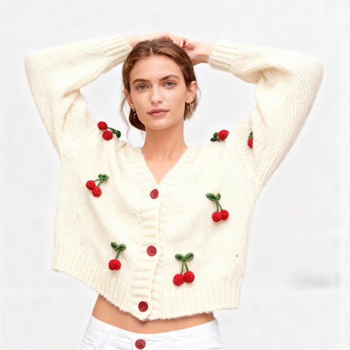 Knitted jacket for women with a cheerful cherry design and practical button details Lune London