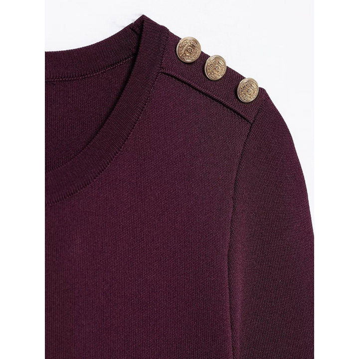 Knitted dress for ladies with decorative button details and practical pockets Lune London