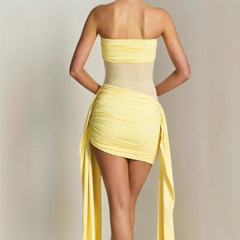 Elegant beach dress for women with elastic fit and refined wrapped design Lune London
