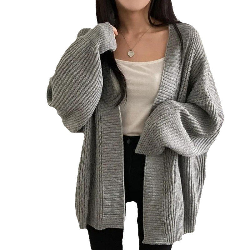 Plus size knitted jacket for women with wide sleeves and a structured texture Lune London