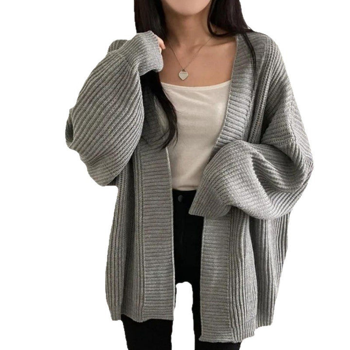 Plus size knitted jacket for women with wide sleeves and a structured texture Lune London