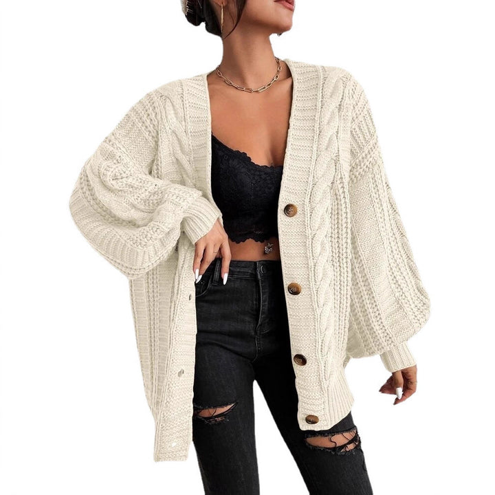 Oversized knitted cardigan for women with an elegant cable pattern and practical buttons Lune London