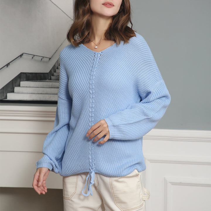 Women's thick knit sweater with an attractive V-neckline and practical drawstring details Lune London