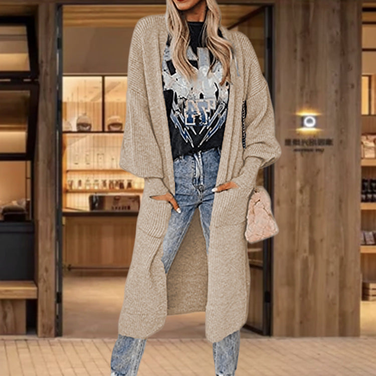 Knitted cardigan for women with wide sleeves and practical inset pockets Lune London
