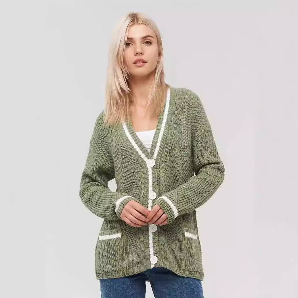 Ladies chunky knitted jacket with practical flap pockets and contrasting details Lune London