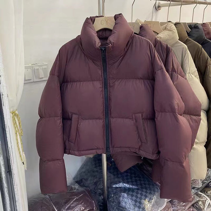 Ladies short functional quilted jacket with high collar and side pockets Lune London