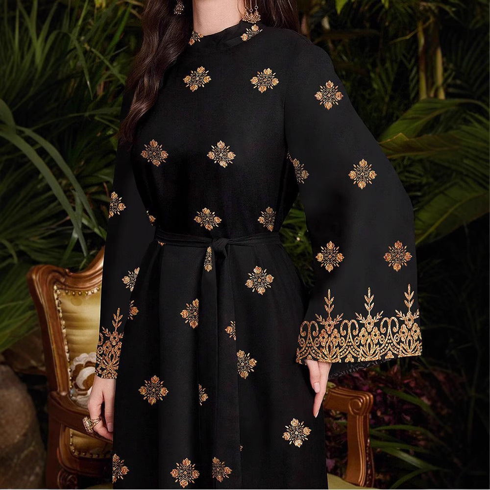 Evening party dress for women with an elegant gold and floral pattern Lune London
